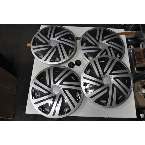 87 - SET OF NEW 14 INCH WHEEL TRIMS