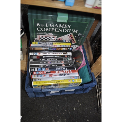 298 - BOX OF DVDS AND GAMES