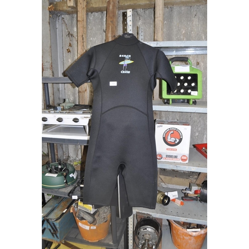 38 - 2 X SHORTIE WETSUITS    TITANIUM AND BEACH CREW