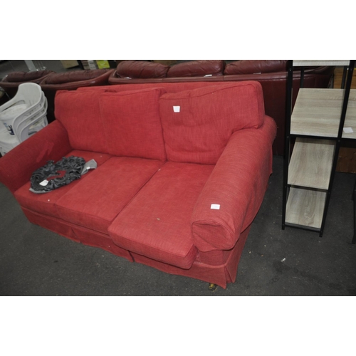 561 - RED UPHOLSTERED 3 SEATER SETTEE