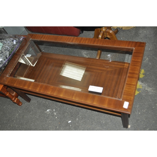 569 - LONG GLASS TOP MAHOGANY COFFEE TABLE