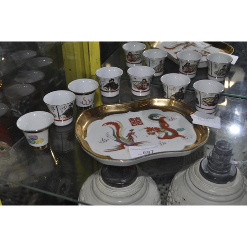 697 - ORIENTAL 7 MINIATURE CUPS AND TRAY