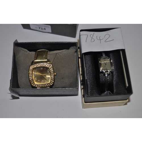 714 - 2 BOXED WATCHES