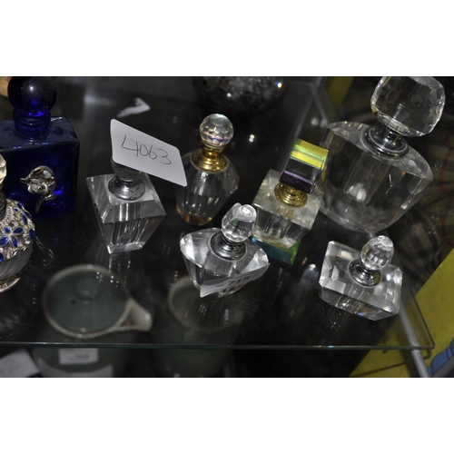 715 - 8 MINIATURE SCENT BOTTLES