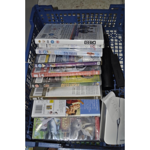 143 - CRATE INC MIXED DVDS AND FIRESTICK WITH REMOTE