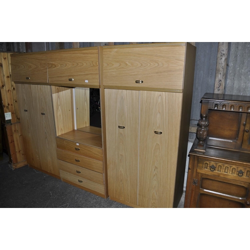 849 - SIMULATED PINE FULL BEDROOM SUITE. 2 DOUBLE WARDROBS, DRESSING TABLE AND TOP BOXES