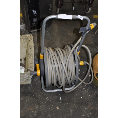 162 - LARGE HOSE ON REEL WITH HEAD