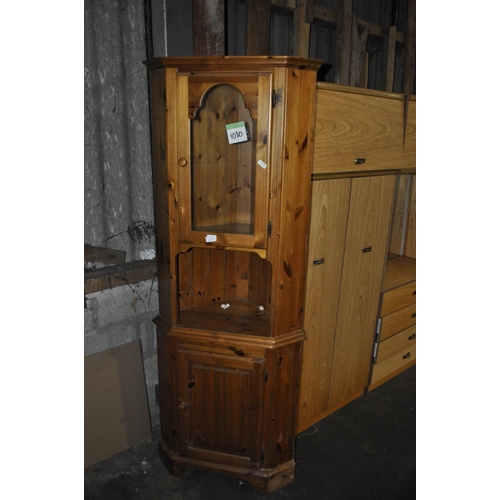 839 - TWO DOOR WOODEN CORNER CABINET