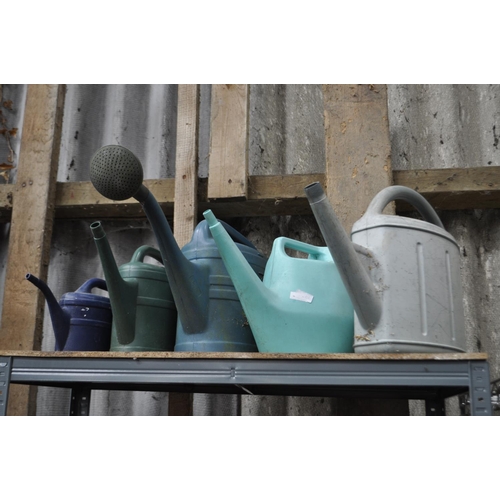 40 - 5 WATERING CANS  1 WITH LARGE ROSE