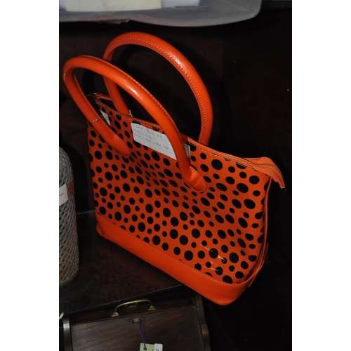 423 - BRAND NEW  FASHION ONLY  ORANGE AND BLACK SPOTTED HANDBAG