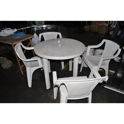 105 - GARDEN TABLE AND 4 CHAIRS