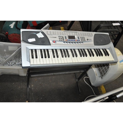 146 - FINE TUNE KEYBOARD WITH STAND NO CHARGER