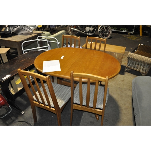 579 - EXTENDING OVAL DINING TABLE AND 4 CHAIRS10