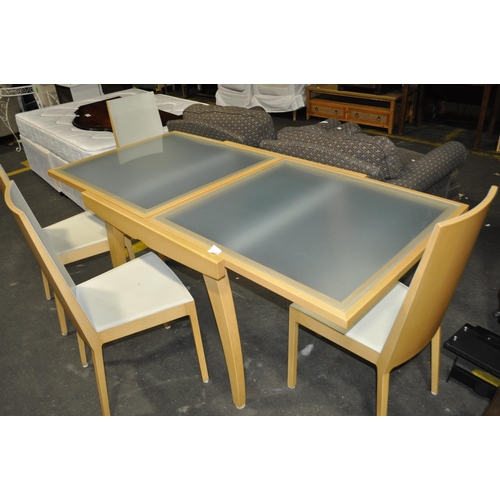 614 - GLASS TOPPED DINING TABLE AND 4 CHAIRS