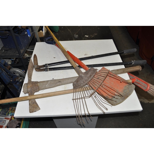 81 - SELECTION OF GARDEN TOOLS INCLUDING PICKAXE, RAKE, EDGERS, SHOVEL AND BROOM