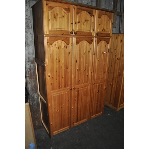 811 - 3 DOOR, PINE WARDROBE WITH 3 DOOR WARDROBE TOP CUPBOARDS
SECTIONAL FOR TRANSPORT
130 X 215 X 53