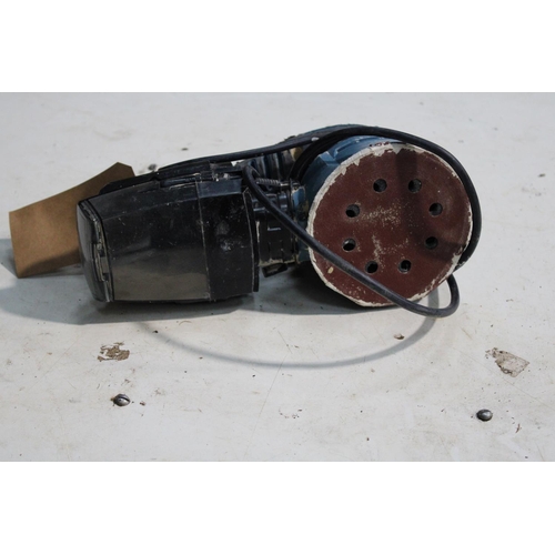 23 - ELECTRIC CORDED PALM SANDER IN GOOD WORKING CONDITION