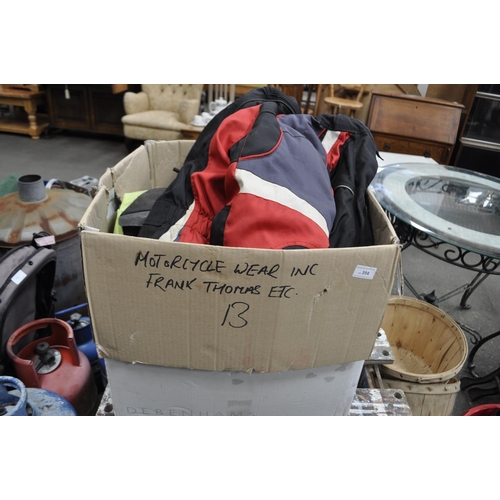 394 - A SELECTION OF MOTORCYCLE CLOTHING INC. FRANK THOMAS AND OTHERS