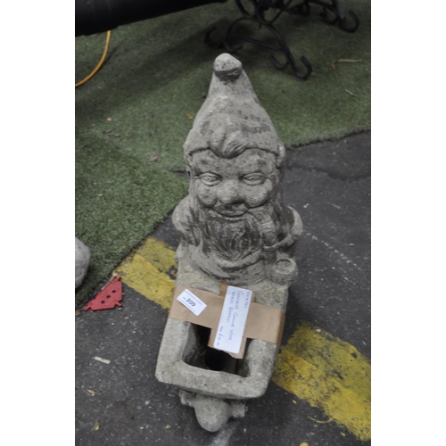 209 - A CONCRETE GNOME WITH WHEELBARROW GARDEN PLANT POT