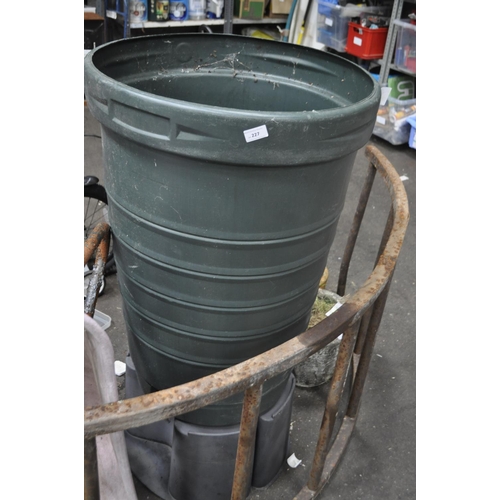 227 - A LARGE WATER BUTT WITH STAND