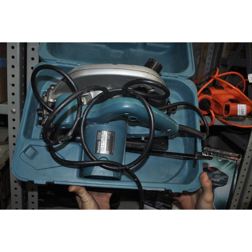 117 - A CASED MAKITA 5704R 1200W CORDED ELECTRIC CIRCULAR SAW IN VERY GOOD CONDITION WITH RIP FENCE AND BL... 