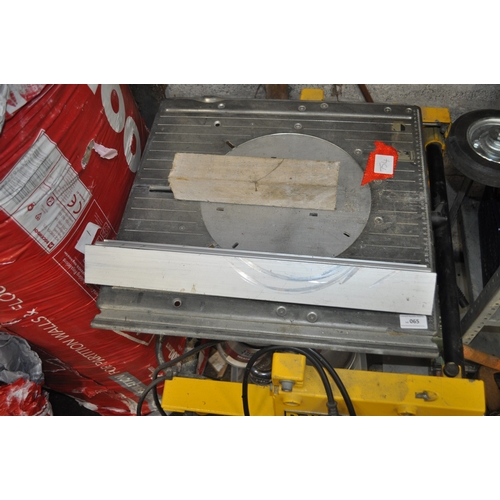 65 - A DEWALT DW 742 CORDED FLIP-OVER CHOP SAW / SAW TABLE IN GOOD CONDITION