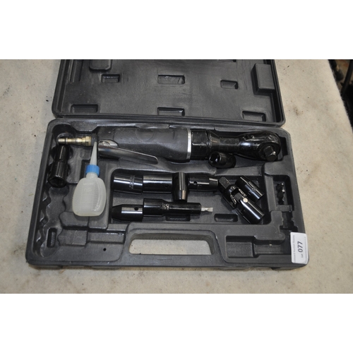 77 - A BOXED AIR RATCHET WRENCH INC ASSORTED SOCKETS