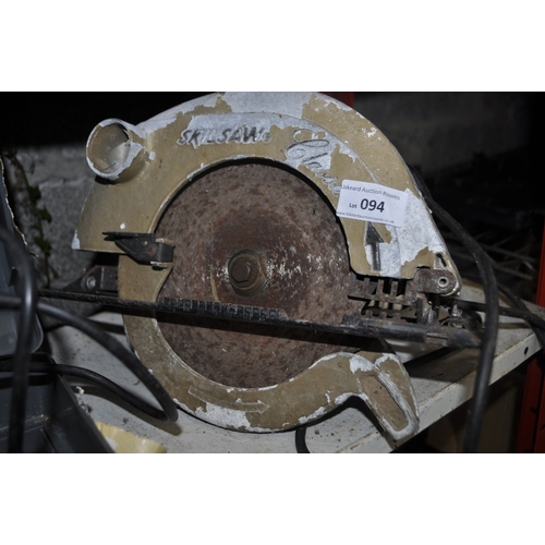 94 - A CASED BOSCH PST 850 PE CORDED JIGSAW AND A VINTAGE SKILSAW