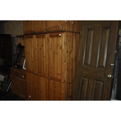 1203 - A CLEAN MODERN PINE TRIPLE WARDROBE WITH ADDITIONAL STORAGE OVER IN VERY GOOD CONDITION - 220CM TALL... 