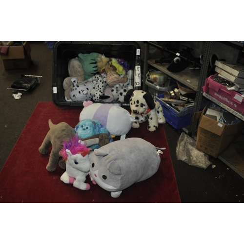 252 - A PLASTIC STORAGE CONTAINER FULL OF SOFT TOYS AND A BAG OF WOODY PLANT TRIMMINGS