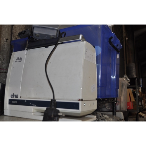 393 - A VINTAGE STELLA ELNA ELECTRIC SEWING MACHINE WITH PEDAL