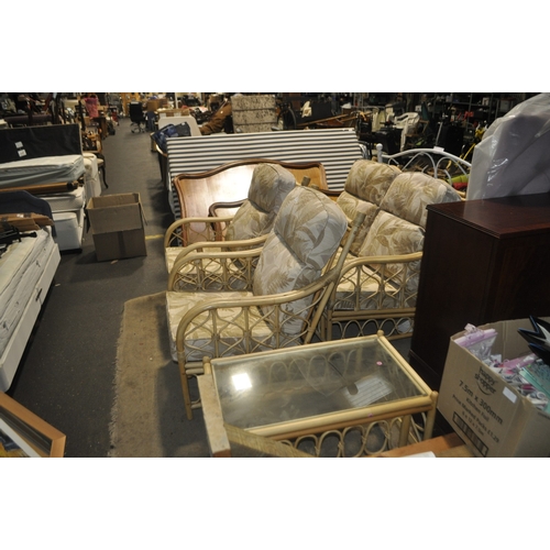 928 - A BAMBOO AND WICKER 3 PIECE CONSERVATORY SUITE COMLETE WITH A MATCHING TABLE