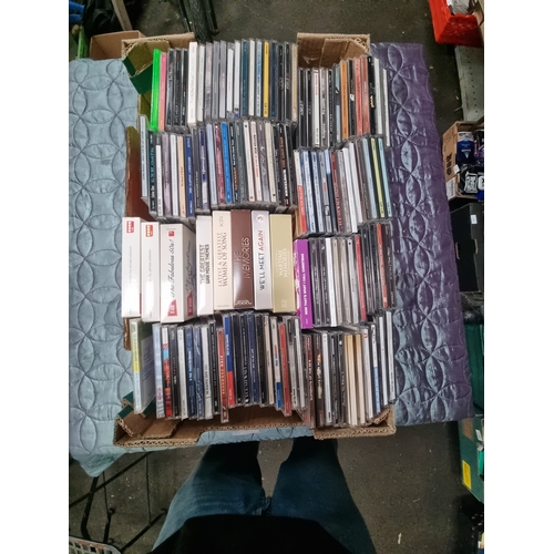 An Assortment of Compact Discs and Multi-Disc Box Sets A large ...
