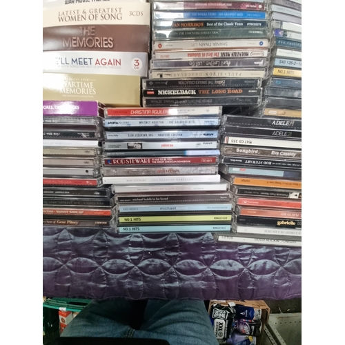 An Assortment of Compact Discs and Multi-Disc Box Sets A large ...