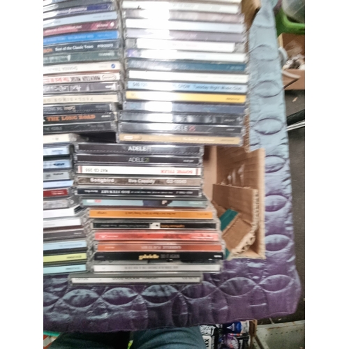 An Assortment of Compact Discs and Multi-Disc Box Sets A large ...