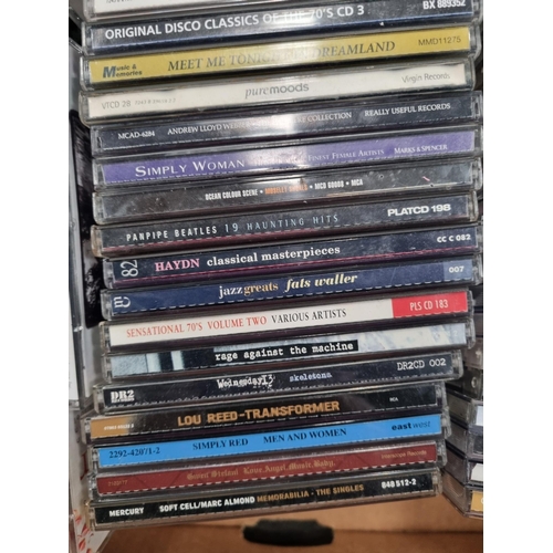 An Assortment of Compact Discs (CDs) Including Eminem, R.A.T.M ...