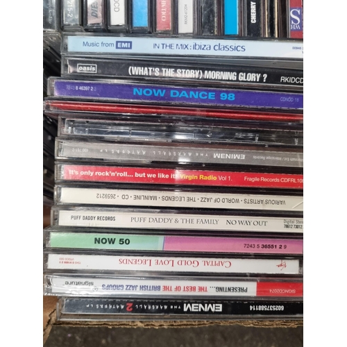 An Assortment of Compact Discs (CDs) Including Eminem, R.A.T.M ...