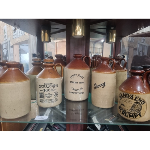 An Assortment of West Country Advertising Stoneware Flagons This lot ...