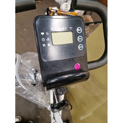 100 - A Bagzzia Folding Stationary Exercise BikeA Bagzzia folding stationary exercise bike featuring a w... 