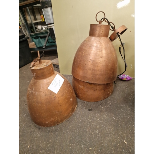 102 - Three Industrial Copper Bell-Shaped Pendant Light FittingsA trio of large industrial-style pendant... 