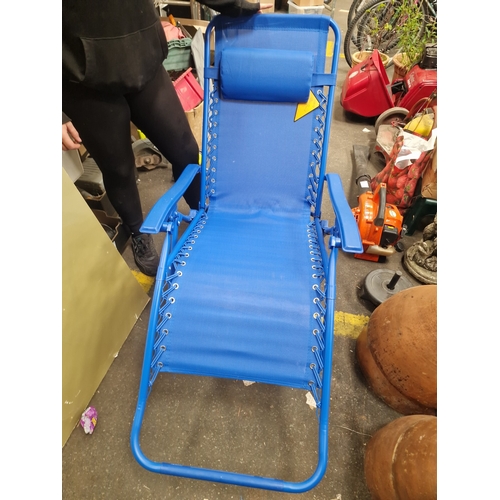 105 - A Contemporary Blue Zero-Gravity Folding Garden LoungerA contemporary zero-gravity folding garden ... 