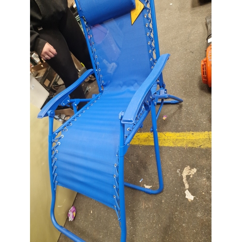105 - A Contemporary Blue Zero-Gravity Folding Garden LoungerA contemporary zero-gravity folding garden ... 