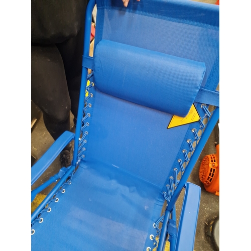 105 - A Contemporary Blue Zero-Gravity Folding Garden LoungerA contemporary zero-gravity folding garden ... 