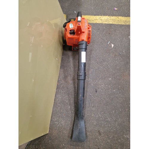 107 - A Single Handheld Petrol Leaf BlowerA single handheld petrol-powered leaf blower featuring an oran... 