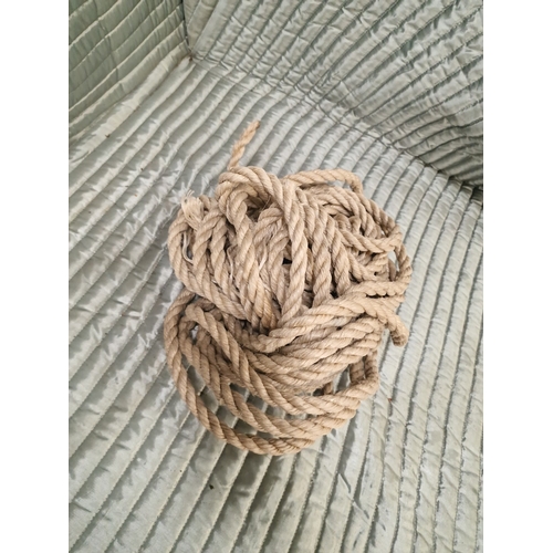 108 - A Coiled Length of Three-Strand Natural Fibre RopeA length of heavy-duty natural fibre rope, featu... 