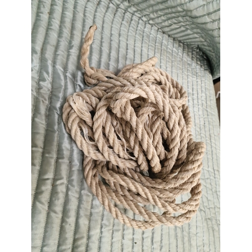 108 - A Coiled Length of Three-Strand Natural Fibre RopeA length of heavy-duty natural fibre rope, featu... 