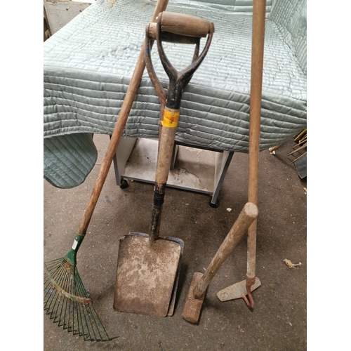 61 - An Assortment of Vintage and Contemporary Garden and Utility ToolsA collection of various garden a... 