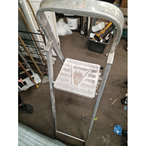 66 - An Aluminium Four-Step Folding Step LadderA folding step ladder manufactured from aluminium. The l... 