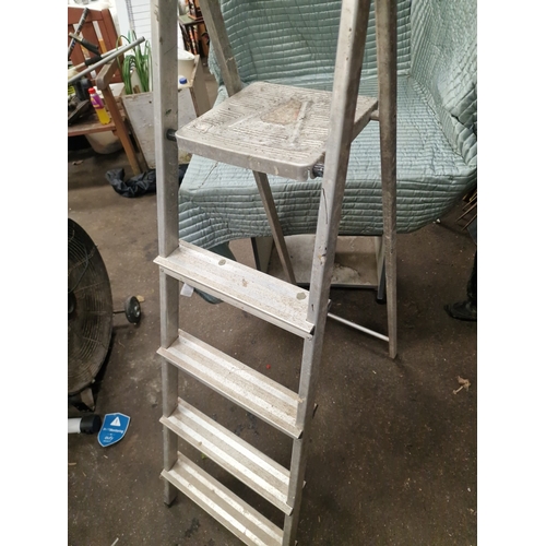 66 - An Aluminium Four-Step Folding Step LadderA folding step ladder manufactured from aluminium. The l... 