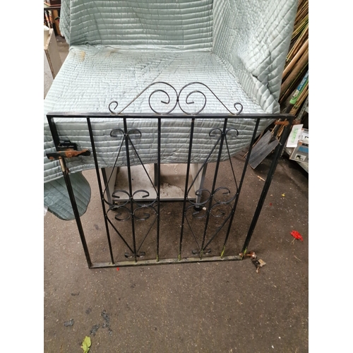 67 - A Decorative Wrought Iron Style Garden Gate with Scrollwork PanelsA single metal pedestrian garden... 